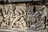 Prambanan - Ramayana reliefs of Shiva Temple. Rama strains Parashurama's bow (scene 8). 